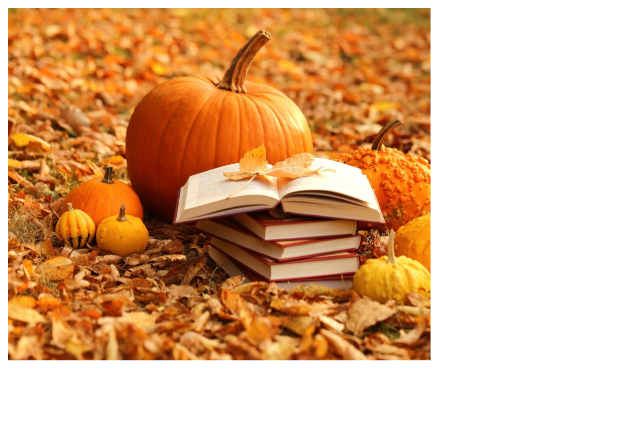 fall leaves on ground with pumpkins next to open books