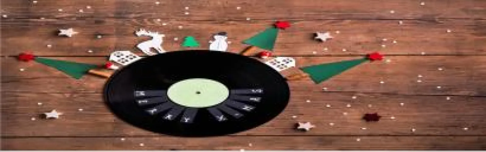 wooden background with record and christmas trees